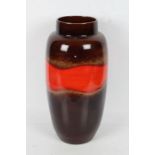 Large West German pottery lava vase, in red and brown glaze, 51cm tall