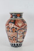 A Large Japanese Imiari vase, the vase of baluster vase with a ribbed body, decorated with floral