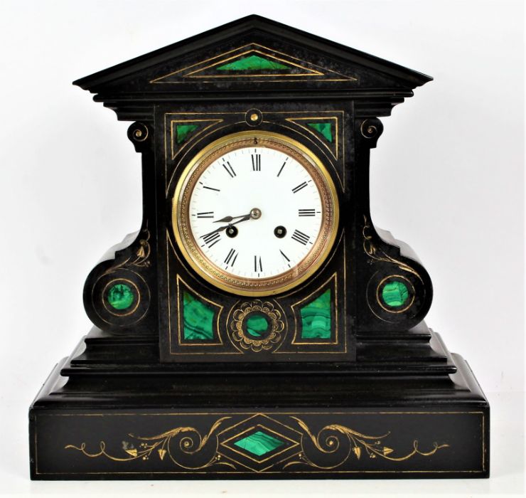 A Victorian black slate and malachite mantle clock, the clock of architectural form inset with