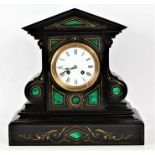 A Victorian black slate and malachite mantle clock, the clock of architectural form inset with