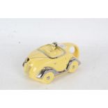 An Art Deco Sadler novelty tea pot in the form of a racing car in yellow and chrome, number plate