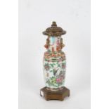 Cantonese porcelain vase, set on a gilt base and with a gilt lid (converted to a lamp), 28cm high