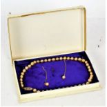 Pearl jewellery set, comprising of a necklace with 9ct gold clasp, and a pair of matching