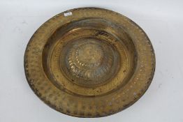 19th century brass "Nuremberg" style alms dish, with a repousse repeating pattern together with