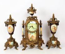 Decorative porcelain and gilt clock garniture, set with porcelain panels depicting courting couples,