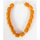 Large yellow/orange Bakelite style necklace, formed of cylindrical beads, approx 48cm long