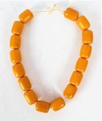 Large yellow/orange Bakelite style necklace, formed of cylindrical beads, approx 48cm long