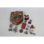 Collection of badges and medals, to include a silver gilt 'Mother Banner Of The World' medal, a
