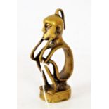 An African brass seated figure, 13cm high