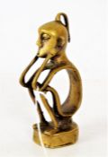 An African brass seated figure, 13cm high