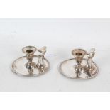 Pair of silverplated chambersticks, by Elkington & Co., each with snuffers, 14.5cm diameter