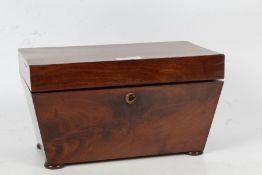 Large early Victorian flame mahogany tea caddy, with a rectangular top opening to reveal three