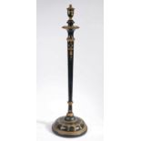 Black and gold painted standard lamp, with knopped and tapering column, with rounded circular