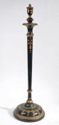 Black and gold painted standard lamp, with knopped and tapering column, with rounded circular