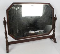 Waring & Gillows oak framed swing mirror, 78.5cm wide