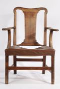 George III mahogany armchair, the arched cresting rail above a flattened splat back and scrolled