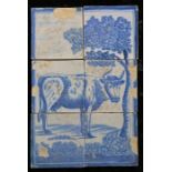 An 18th century Dutch Delft tile panel Designed in blue, with a cow under a tree, 26cm x 39cm