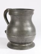 An early 19th century pewter Imperial gallon bulbous measure, English Crowned 'GR' (?) mark to
