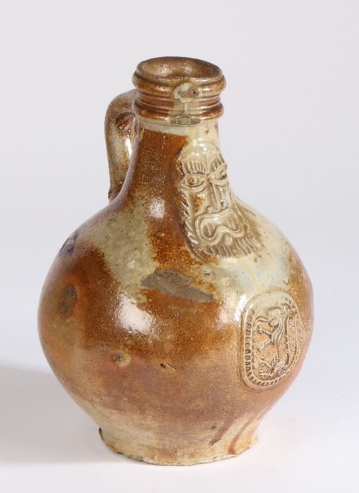 A 17th Century salt glaze Bellarmine jug With a bearded mask above a medallion to the bulbous - Image 2 of 2