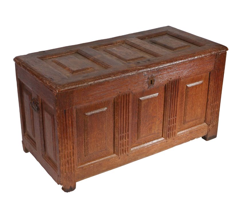 A 17th century oak coffer, German/Flemish The lid with three raised panels, and conforming front, - Image 2 of 6