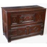 A Charles I joined oak court cupboard base, North Country, circa 1640 Having a triple-boarded and