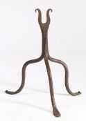 A late 18th century wrought iron table-top ‘light / tool’ rest, possibly Scottish Designed with a