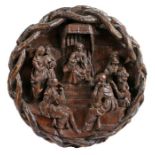 A rare late 15th century carved oak roundel, circa 1500 Carved with very high relief with fine