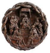 A rare late 15th century carved oak roundel, circa 1500 Carved with very high relief with fine