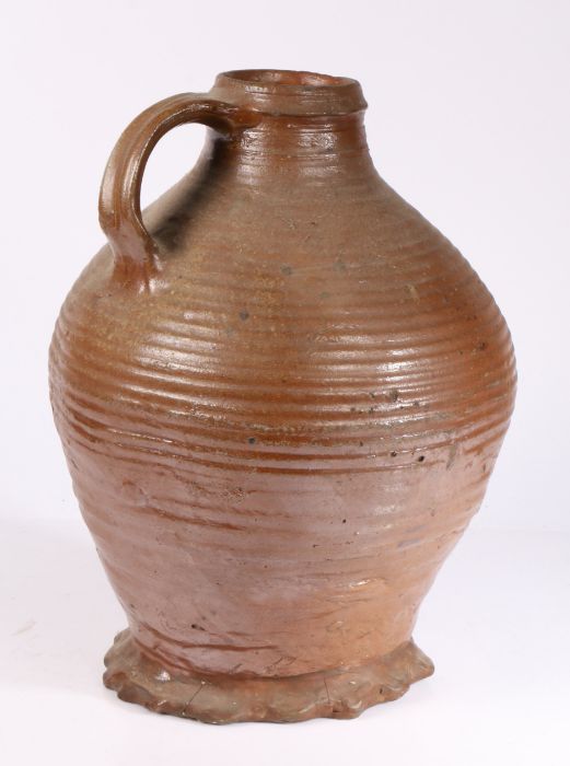 A large 16th century German medieval stoneware jug, circa 1500 - 1550 With a short neck body above a - Image 2 of 2