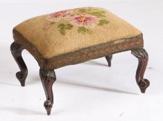 A 19th century walnut and upholstered miniature stool, English Having a rectangular padded seat