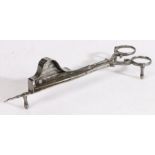 An 18th century iron candle-snuffer, with maker’s mark, English Of scissor form, one blade with a