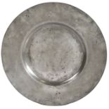 A Charles II pewter broad rim charger, Hampshire, circa 1680 The rim with incised edge, and