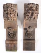A pair of large 19th century oak corbels, in the 16th century manner Each carved with a Green Man