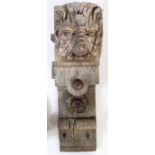 A  large 19th century oak corbel, in the 16th century manner Carved with a Green Man mask, topped by