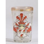 A German glass and enamel beaker, 16th Century or later, Designed with a coat of arms, the name '