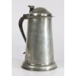 A Queen Anne pewter straight-sided dome-lidded flagon, Lancashire, circa 1710 Having a plain,