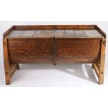 An 19th century fruitwood dough bin The three-quarter gallery back and two removable plank tops