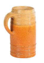 An 18th century salt glaze tankard The cylindrical body with ring decoration and loop handle, 17.5cm
