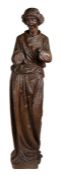 A carved oak figure of the Archangel Gabriel, circa 1480-1520 Modelled with hair swept back, wearing