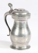 An Imperial pewter 2-glass dome-lidded measure, Glasgow, circa 1860 With two pairs of incised