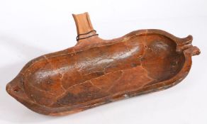 An 18th century pottery basting pan The rectangular pan with loop and spout, restored, 52cm long