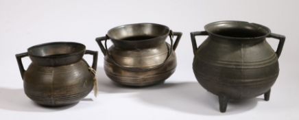 Three 16th  -17th C=century bronze cauldron A 17th century example with two pairs of three cords