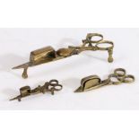 Three miniature 19th century brass candle-snuffers, English Including two toy examples, each of