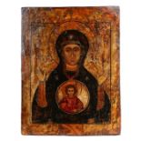A 17th century Greek Orthodox icon The Virgin Mary with Christ giving blessings, in a roundel,