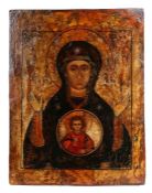 A 17th century Greek Orthodox icon The Virgin Mary with Christ giving blessings, in a roundel,