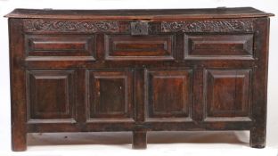 A large Charles II oak coffer, North Country, circa 1680 Having a triple-panelled hinged lid, the