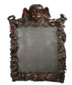 A William & Mary carved oak wall mirror, circa 1700 and later In the manner of Grinling Gibbons (