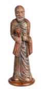 A 17th/18th century Spanish Colonial carved and painted figure of St Peter Dressed in blue, red