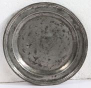 An early 18th century pewter single-reeded plate, Bristol, circa 1715 Hallmarks and touchmarks to