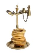 A brass wax-jack, probably early -mid 19th century, English Designed for a pre-coiled taper, dropped